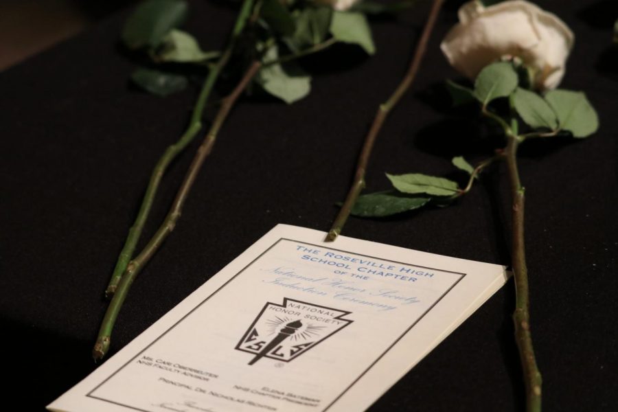 At+the+induction+ceremony%2C+students+received+a+certificate+and+a+rose+and+recited+a+pledge+to+the+National+Honors+Society.+